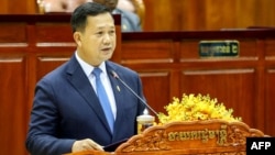 រូបឯកសារ៖ លោក ហ៊ុន ម៉ាណែត នាយករដ្ឋមន្ត្រី​ថ្មី​របស់​កម្ពុជា ថ្លែង​ទៅ​​កាន់​រដ្ឋសភា​ជាតិ កាល​ពី​ថ្ងៃ​ទី​២២ ខែ​សីហា ឆ្នាំ​២០២៣។ (Photo by Handout / AFP)