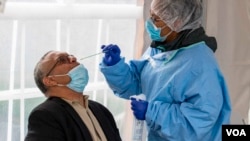 Testiranje na Kovid 19 - ilustrativna fotografija (AP Photo/Michael Conroy)