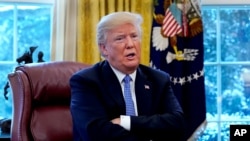 Presiden AS Donald Trump saat diwawancarai oleh Reuters di Gedung Putih, Washington, DC, 17 Januari 2018. 