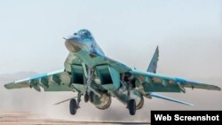 Hərbi təyyarə (Arxiv foto)