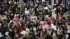Demonstrators gather during a protest at Hong Kong International Airport, Friday, July 26, 2019.