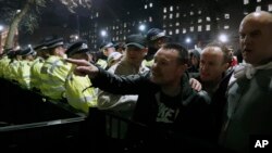 Pro-Brexit protesters clash with police after their rally in Westminster, London, March 29, 2019. Pro-Brexit demonstrators were gathering in central London on the day that Britain was originally scheduled to leave the European Union.