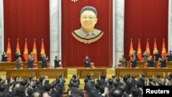 North Korean leader Kim Jong Un (C) supervises a meeting of the Central Committee of the Workers' Party of Korea, under a portrait of his father, Kim Jong Il, in Pyongyang. The photo was released on February 18, 2015 by North Korea's Korean Central News Agency (KCNA photo via REUTERS)