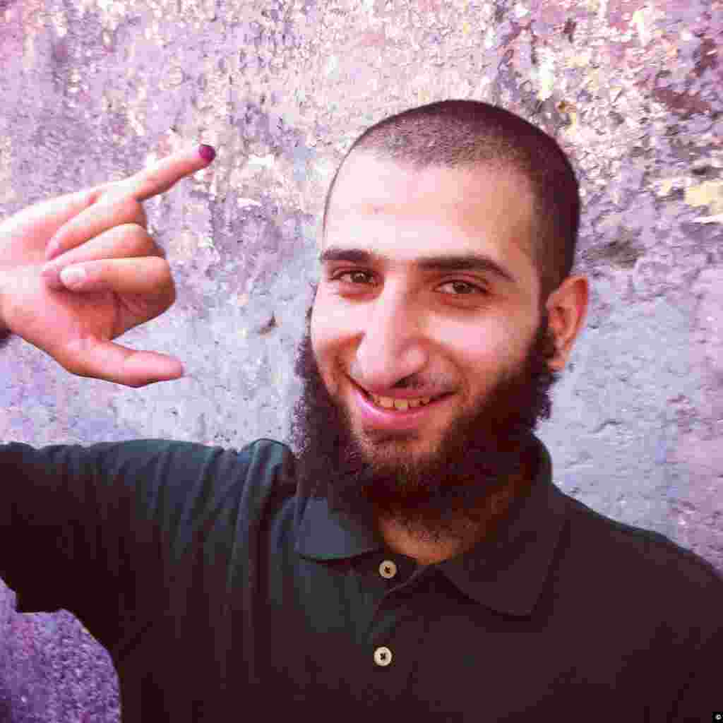 A young Egyptian voter on June 16th, 2012 says he is voting for Muslim Brotherhood's candidate Morsi because he feels the Islam religion should govern all matters even politics.