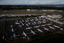 FILE PHOTO: Boeing 737 Max aircraft are parked in a parking lot at Boeing Field in this aerial photo taken over Seattle