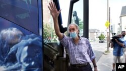 U.S. Sen. Ed Markey, D-Mass., waves while boarding his campaign bus at the conclusion of a campaign stop, Sept. 1, 2020, in Boston.