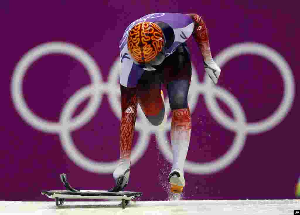John Fairbairn of Canada starts a run during the men&#39;s skeleton training, Krasnaya Polyana, Russia,&nbsp;Feb. 11, 2014.