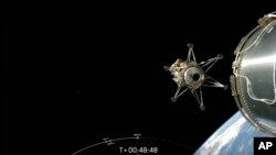 This image from video provided by SpaceX via NASA TV shows Intuitive Machines' lunar lander separating from the rocket's upper stage and heading toward the moon, on Feb. 15, 2024. (SpaceX -NASA TV via AP)