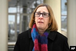 FILE - U.S. Ambassador to Russia Lynne Tracy speaks to the media after a hearing on Wall Street Journal reporter Evan Gershkovich's case at the Moscow City Court in Moscow, Russia, on Dec. 14, 2023.