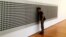 Tristan Perich's "Mictrotonal Wall" breaks down "white noise" into 1500 of an infinite number pitches that can be experienced together and in sequence by MoMA visitors. (Adam Phillips/VOA) 