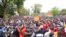 By police estimates, some 10,000 people take part in a protest on Nation Square, Ouagadougou, Jan. 18, 2014.