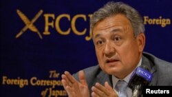 Dolkun Isa, president of the World Uyghur Congress, attends a news conference with in in Tokyo, Sept. 30, 2022. The WUG is facing harassment from China as its general assembly is set to begin this week. 