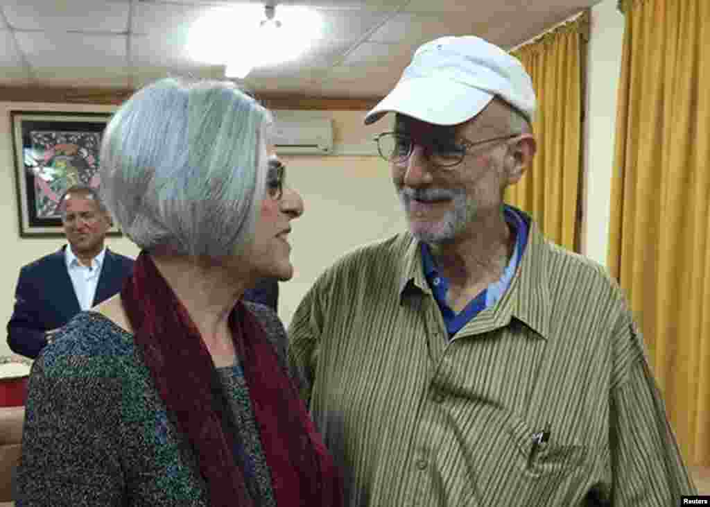 Alan Gross, a U.S. citizen who was recently released from a Cuban prison after being incarcerated for more than five years, speaks with his wife, Judy, shortly before leaving Havana on Dec. 17, 2014.