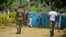 FILE - Government soldiers are seen on patrol in Bafut, in the restive northwest English-speaking region of Cameroon, Nov. 15, 2017.