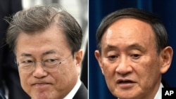 문재인 한국 대통령과 스가 요시히데 일본 총리.