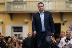 FILE - Serbia's Foreign Minister Ivica Dacic attends a rally in Novi Sad, Serbia, March 18, 2017.