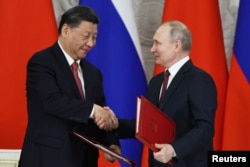 Russia's Putin holds talks with China's Xi in Moscow