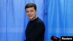 FILE - Ukrainian comic actor and presidential candidate Volodymyr Zelenskiy at a polling station during a presidential election in Kiev, Ukraine March 31, 2019. 
