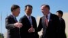 US National Security Adviser Jake Sullivan is welcomed by Yang Tao, center, from China's foreign ministry and U.S. Ambassador to China Nicholas Burns upon arriving at the Beijing Capital International Airport in Beijing on Aug. 27, 2024.