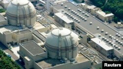 FILE - An aerial view shows Kansai Electric Power Co's Ohi nuclear power plant's No. 4 reactor (front) in Ohi, Fukui prefecture.