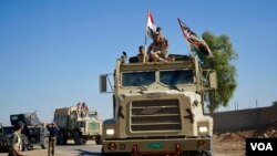 کاروان قوای عراق حین پیشروی بیشتر به داخل موصل، جائیکه تندروان داعش برای بیش از دو سال حاکمیت داشته اند. 