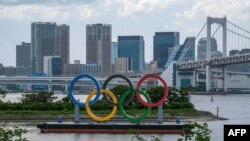 Cincin olimpiade di tepi pantai Odaiba, Tokyo, 3 Juni 2021. (Foto: Kazuhiro NOGI / AFP)