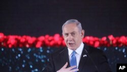 Le Premier ministre israélien Benjamin Netanyahu prononce un discours lors de l'inauguration d'un monument en l'honneur des vétérans et des victimes du siège de Leningrad à Jérusalem, le jeudi 23 janvier 2020. (Marc Israel Sellem/Pool Photo via AP)