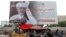 A billboard depicting Afghanistan's President Ashraf Ghani, who is seeking re-election, is displayed in Kabul, Afghanistan Sept. 25, 2019.
