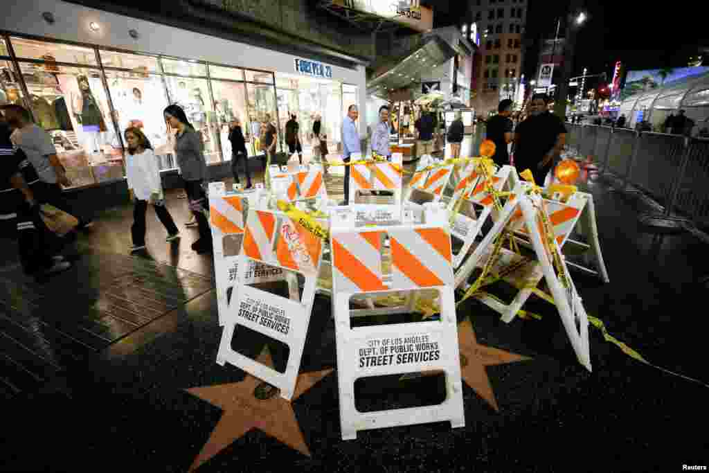 Barricades surround the location of the Hollywood Walk of Fame Star belonging to President Elect Donald Trump along Hollywood Blvd. in Los Angeles, California, Nov. 14, 2016.