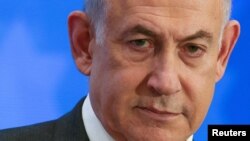 Perdana Menteri Israel Benjamin Netanyahu menghadiri sebuah acara di Yerusalem, pada 18 Februari 2024. (Foto: Reuters/Ronen Zvulun)