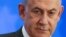 FILE - Israeli Prime Minister Benjamin Netanyahu addresses the Conference of Presidents of Major American Jewish Organizations in Jerusalem, Feb. 18, 2024. Set to visit Washington July 22, 2024, he said he would be seeking to solidify bipartisan U.S. support for his country.