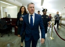 FILE - Kurt Volker, a former special envoy to Ukraine, leaves after a closed-door interview with House investigators as House Democrats proceed with the impeachment investigation of President Donald Trump, at the Capitol in Washington, Oct. 3, 2019.