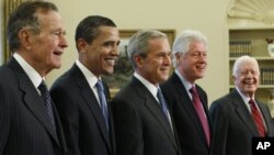 Members of the exclusive Presidents Club (from left) George H.W. Bush, Barack Obama, George W. Bush, Bill Clinton and Jimmy Carter, Wednesday, Jan. 7, 2009, in the Oval Office of the White House in Washington.