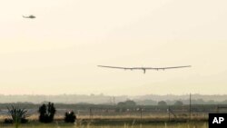 The Solar Impulse 2 plane lands at the San Pablo airport in Seville, Spain on Thursday, June 23, 2016. An experimental solar-powered airplane Thursday completed an unprecedented three-day flight across the Atlantic in the latest leg of its globe-circling voyage. (AP Photo/Laura Leon)