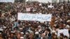 Shi'ite Muslims take part in a protest against Saturday's bomb attack in Quetta February 19, 2013.