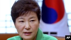FILE - South Korean President Park Geun-hye speaks during a regular meeting at the presidential house in Seoul, South Korea.