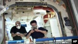 Sand artist Sudarshan Pattnaik works on a sculpture about Cyclone Phailin that hit Puri in the eastern Indian state of Odisha.