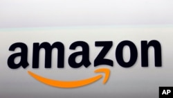 FILE - Amazon plans to close its domestic marketplace in China to focus on more lucrative businesses there. 