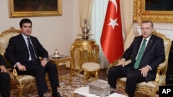 Turkish Prime Minister Recep Tayyip Erdogan, right, and Nechirvan Idris Barzani, head of Regional Government of Iraqi Kurdistan, meet in Ankara, Nov. 27, 2013.