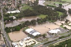 FILE - This image from a video, shows flooded fields on Gold Coast, Australia, Jan. 18, 2020.