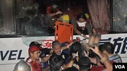 Operasi penyelamatan para sandera dalam pembajakan bis di Manila pada tanggal 23 Agustus yang dikecam oleh Hong Kong.