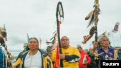 Protesters demonstrate against the Energy Transfer Partners' Dakota Access oil pipeline near the Standing Rock Sioux reservation in Cannon Ball, North Dakota, Sept. 9, 2016.