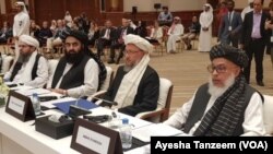 Delegasi Taliban dalam perundingan damai dengan Amerika, dipimpin oleh Sher Mohammad Abbas Stanekzai (kanan). (foto: dok).