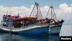 ទូក​នេសាទ​របស់​វៀតណាម​​​ត្រូវ​បាន​គេ​​ឃាត់​ទុក​ក្នុង​ដែនទឹក​របស់​ម៉ាឡេស៊ី ថ្ងៃ​ទី ១៧ ខែ​សីហា ឆ្នាំ​២០២០។ 