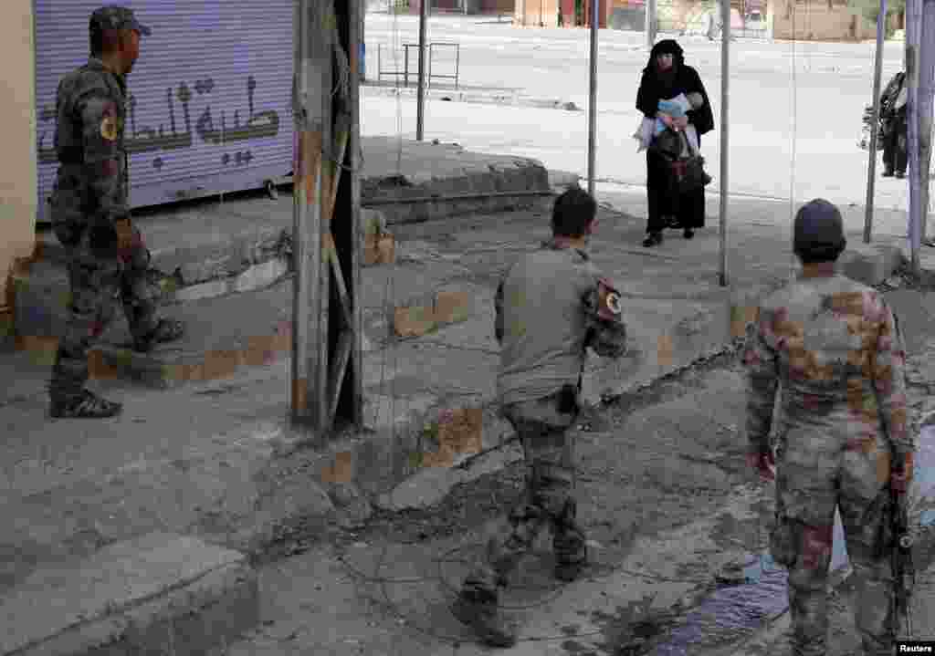 The peloton rides past a sunflower field during the 213.5-km stage 4 of the Tour de France cycling race between Reims and Nancy, France.