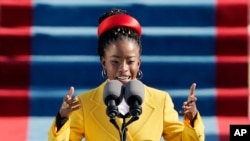American poet Amanda Gorman reads a poem during the 59th Presidential Inauguration at the U.S. Capitol in Washington, Jan. 20, 2021.