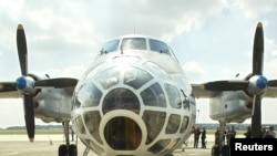 FILE - A Russian Antonov-30B airplane is parked on the tarmac at a military airport in Melsbroek, Aug, 13, 2002. A Russian military mission was in Belgium for bservation overflights in accordance with the 'Open Skies Treaty'. 