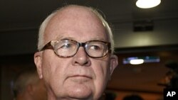 U.S. Special Envoy for North Korea Policy Stephen Bosworth leaves his hotel for the United States Mission in Geneva, October 24, 2011.