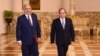 Libyan military commander Khalifa Haftar walks with Egyptian President Abdel Fattah el-Sissi at the Presidential Palace in Cairo, Apr. 14, 2019 in this handout picture courtesy of the Egyptian Presidency. 