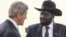 South Sudan's President Salva Kiir (R) listens as he greets U.S. Secretary of State John Kerry at the President's Office in Juba, South Sudan, May 2, 2014.